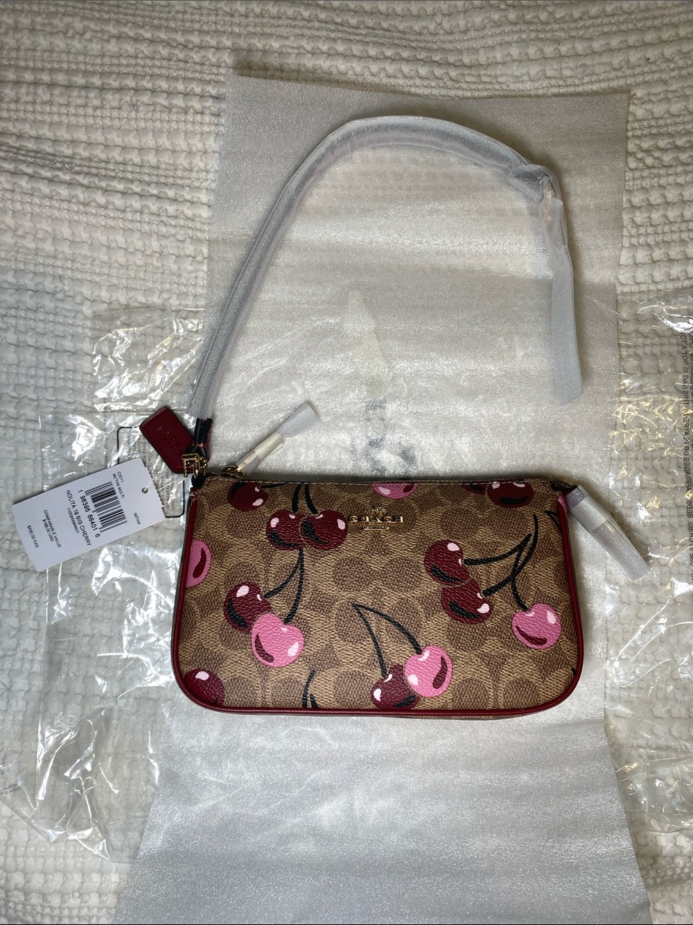 NWT Coach Nolita 19 in Brown Signature canvas with Cherry-print🍒